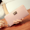 Billetera Clutch Crossbody con Compartimento para Celular y Patrón Geométrico