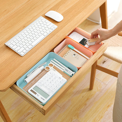Teal rectangular plastic storage tray with an open top, ideal for organizing items on a desk or in a drawer. - Image 3