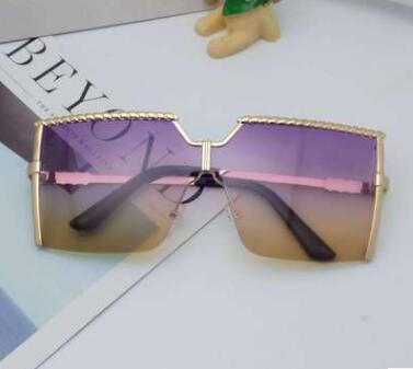 Frameless conjoined sunglasses with gold metal frame and braided detail, featuring brown gradient lenses. - Image 18