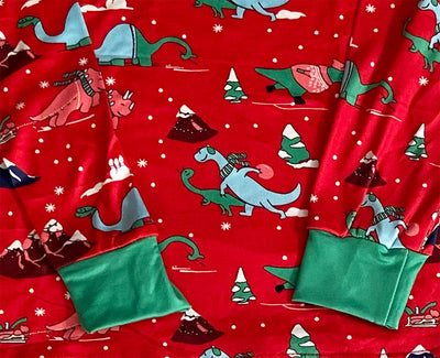 Red long-sleeved men's pajama set with a festive dinosaur and Christmas tree print, featuring green cuffs. - Image 22