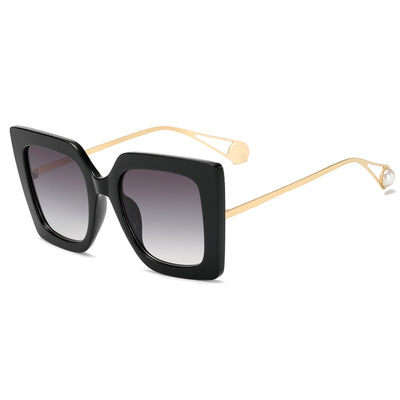 Women's black square frame sunglasses with blue gradient lenses and gold metal temples featuring a pearl accent. - Image 15