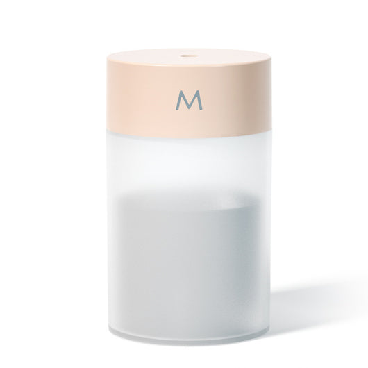 M Style mini humidifier with a light blue top and translucent white body, suitable for bedroom or office. - Image 4