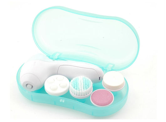 White electric facial cleanser with multiple brush and sponge attachments in an open translucent teal carrying case. - Image 9