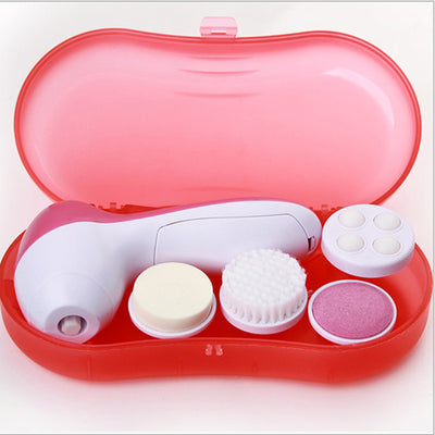 White electric facial cleanser with multiple brush and sponge attachments in an open translucent teal carrying case. - Image 11