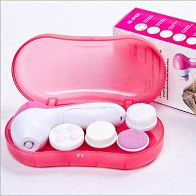White electric facial cleanser with multiple brush and sponge attachments in an open translucent teal carrying case. - Image 7