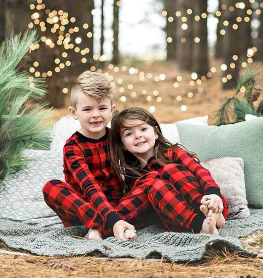 Red and black buffalo plaid baby romper with long sleeves, snap front closure, and black ribbed cuffs and collar. - Image 3