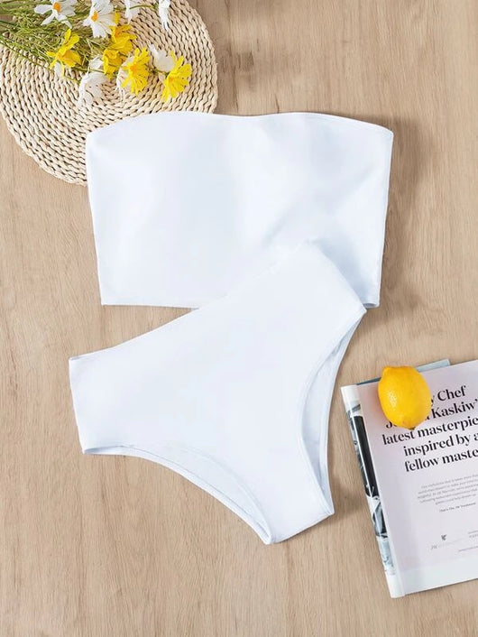 Vibrant orange strapless bandeau bikini top and high-waisted bottoms set, worn by a woman with a white shirt. - Image 25
