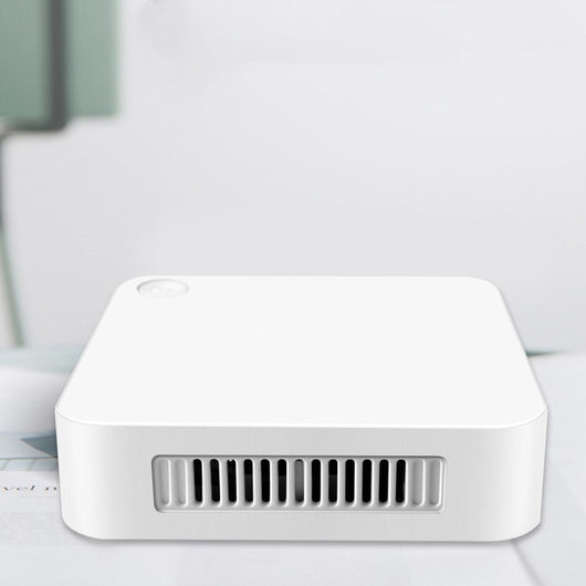 White square household car sterilizer purifier with a power button and blue-lit ventilation slots. - Image 9