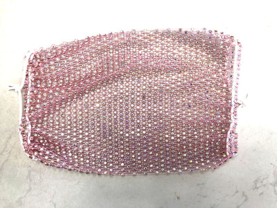 Close-up of a blue mesh fabric adorned with numerous small, clear rhinestones, creating a sparkling texture. - Image 16