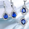 Conjunto de Aretes y Anillo con Corazón de Flores