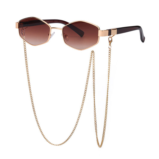 Women's hexagonal sunglasses with dark lenses, gold-colored metal frame, black temples, and a detachable gold chain. - Image 16