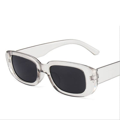 Black rectangular fashion sunglasses with dark lenses, featuring a thick frame and temples, angled on a white background. - Image 18