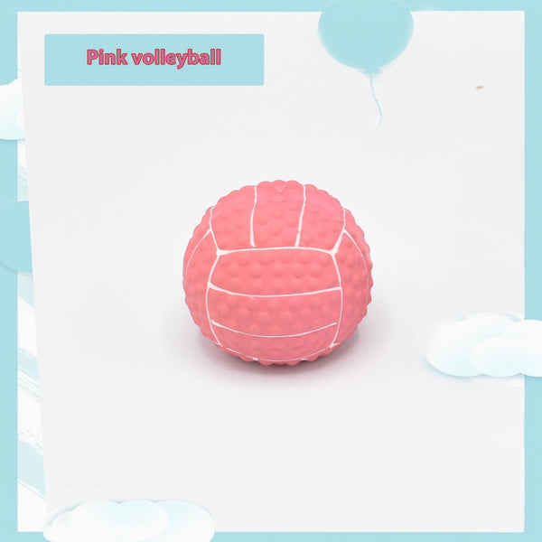 Pink latex pet toy shaped like a mini volleyball with white seams and a textured surface. - Image 5