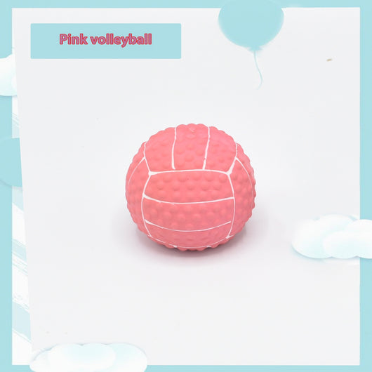 Pink latex pet toy shaped like a mini volleyball with white seams and a textured surface. - Image 5