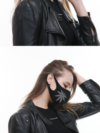 Black face mask with a sparkling rhinestone star design, modeled by a woman wearing a black leather jacket. - Image 7