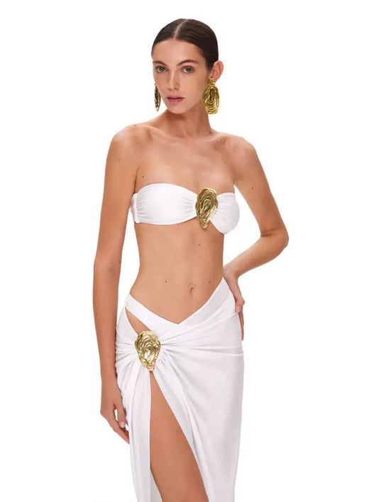 White satin three-piece bikini set with strapless top, high-waisted bottom, and sarong skirt, featuring gold shell details. - Image 9