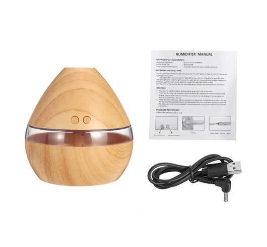 Light wood grain teardrop ultrasonic humidifier and essential oil diffuser with a clear LED light band. - Image 3