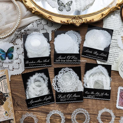 Set of 15 white lace-patterned circular stickers with intricate designs, labeled "North Star Arch" and "30 sheets."