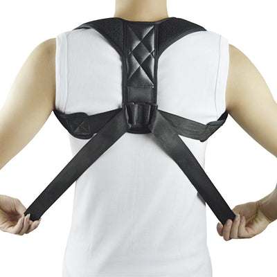 Black back shoulder spine posture corrector worn over a white long-sleeved shirt, showing adjustable straps. (2 pcs) - Image 8
