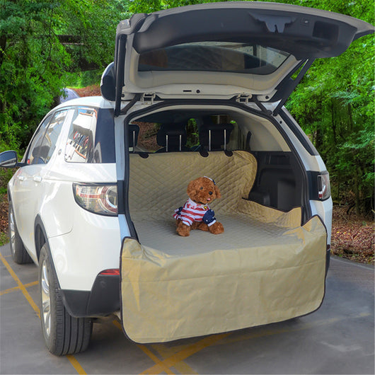 Gray quilted pet car mat installed in the trunk of a white SUV, protecting the cargo area and bumper. - Image 5