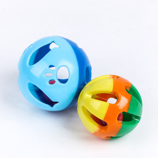 Colorful hollow plastic cat toy ball with purple, lime green, and blue sections, featuring a red bell inside. - Image 3