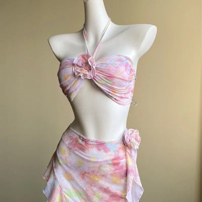 Women's floral split skirt-style swimsuit bikini three-piece suit with halter top and sheer wrap skirt. - Image 8