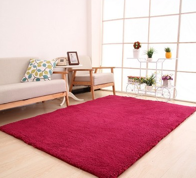 Fluffy purple rectangular area rug on a light wood floor in a modern living room with a sofa and plant stand. - Image 9