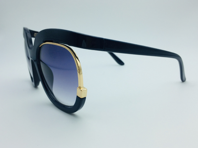 Black cat-eye half-frame sunglasses with gold accents and purple-grey gradient lenses, shown from front and side. - Image 3