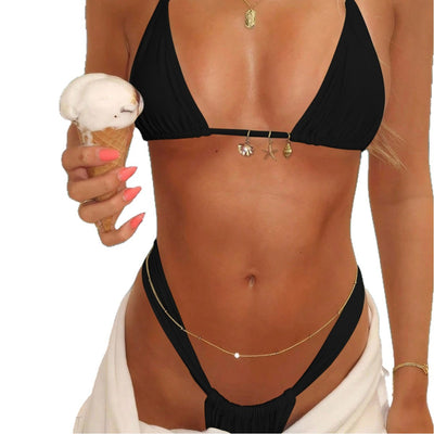 Black solid-color triangle-bra swimsuit with tie-front bikini bottom on a white towel with beach accessories. - Image 5