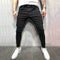 Pantalón Denim Slim Negro con Estampado a Rayas