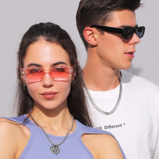 Rectangular tortoiseshell sunglasses with a small frame and dark gray lenses, angled on a white background.