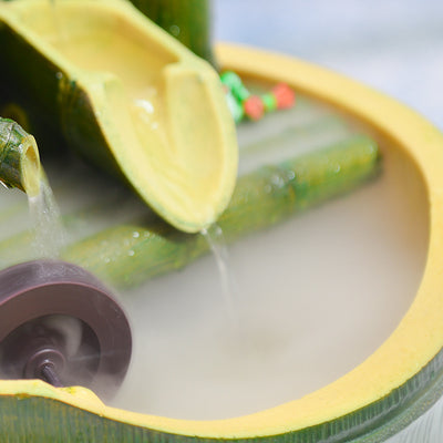 Green bamboo-themed indoor water fountain with multiple tiers, a water wheel, and small frog and butterfly accents. - Image 4