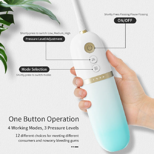 White and rose gold portable electric water flosser with a curved nozzle and volume markings for 160ml and 200ml. - Image 4