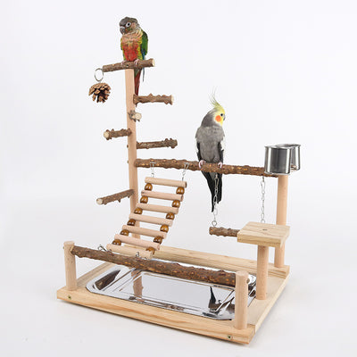 Multi-level natural wood parrot play stand with perches, ladder, swings, and two stainless steel feeding cups. - Image 2