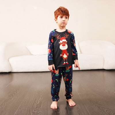 Family Christmas pajamas with a cartoon reindeer wearing a Santa hat and red scarf on a black top, and dark blue pants with a repeating reindeer and holly patte - Image 2