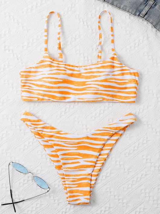 Tan and white zebra stripe two-piece bikini with a bandeau top and high-cut bottom, laid flat. - Image 16