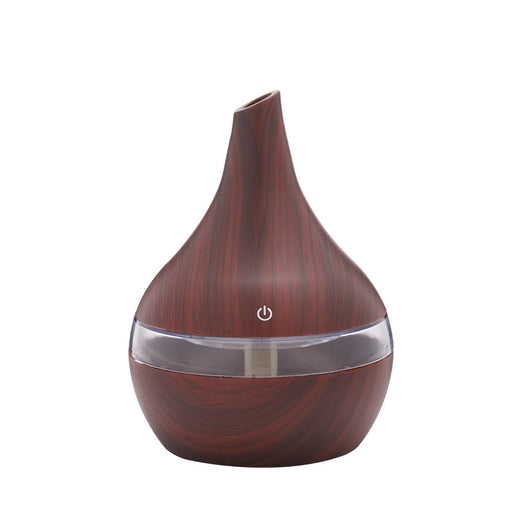 Teardrop-shaped humidifier with light wood grain finish and clear water tank, featuring a power button icon. - Image 8
