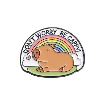 Cute capybara enamel brooch wearing a pink donut with sprinkles and "DONUT WORRY BE CAPPY" text. - Image 18
