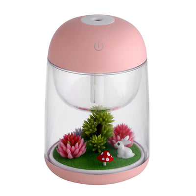 Pink and clear columnar humidifier with a micro landscape inside, featuring a white rabbit, red mushroom, and artificial plants. - Image 7