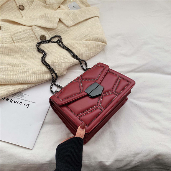 Bolso de Mano Texturizado en Tonos Naturales - Versátil y Elegante