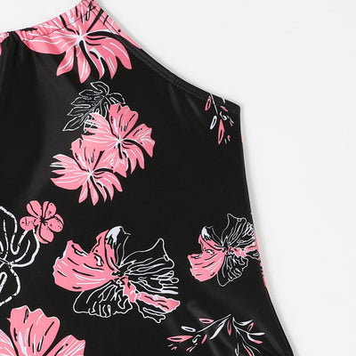 Black halter-neck tankini swimsuit with pink and white floral print, paired with solid black high-cut bikini bottoms. - Image 3