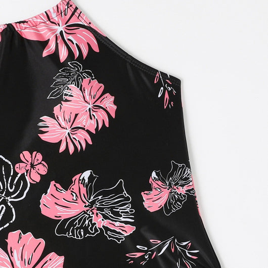 Black halter-neck tankini swimsuit with pink and white floral print, paired with solid black high-cut bikini bottoms. - Image 3