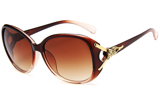 Brown oversized women's sunglasses with gradient lenses and gold-tone fox head embellishments on the temples. - Image 4