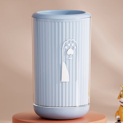 Light blue pet foot washing cup with a white paw print design, ribbed texture, and smooth base. - Image 21