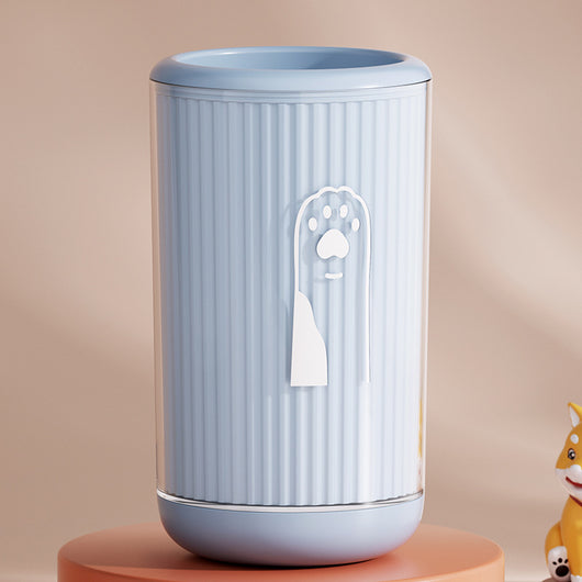 Light blue pet foot washing cup with a white paw print design, ribbed texture, and smooth base. - Image 21