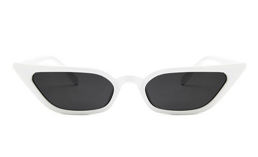 Narrow cat-eye sunglasses with a transparent yellow frame and yellow tinted lenses on a white background. - Image 9