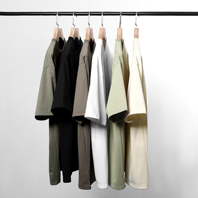 Moss green short-sleeve cotton t-shirt with a crew neck and a relaxed, oversized fit. - Image 2