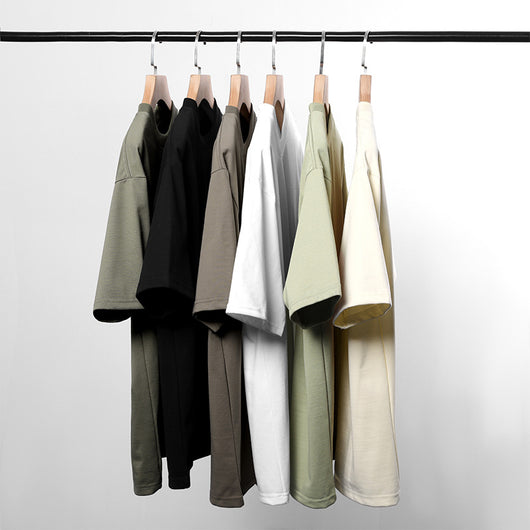 Moss green short-sleeve cotton t-shirt with a crew neck and a relaxed, oversized fit. - Image 2