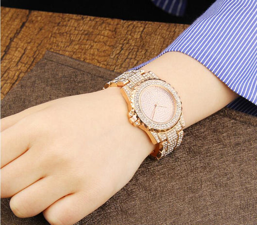 Reloj de Cuarzo Dorado con Cristales Brillantes para Mujer