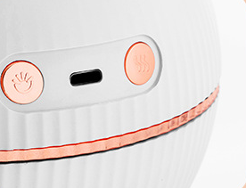 Pink spherical humidifier with a white top, ribbed texture, rose gold band, and a digital display showing 73%. - Image 18